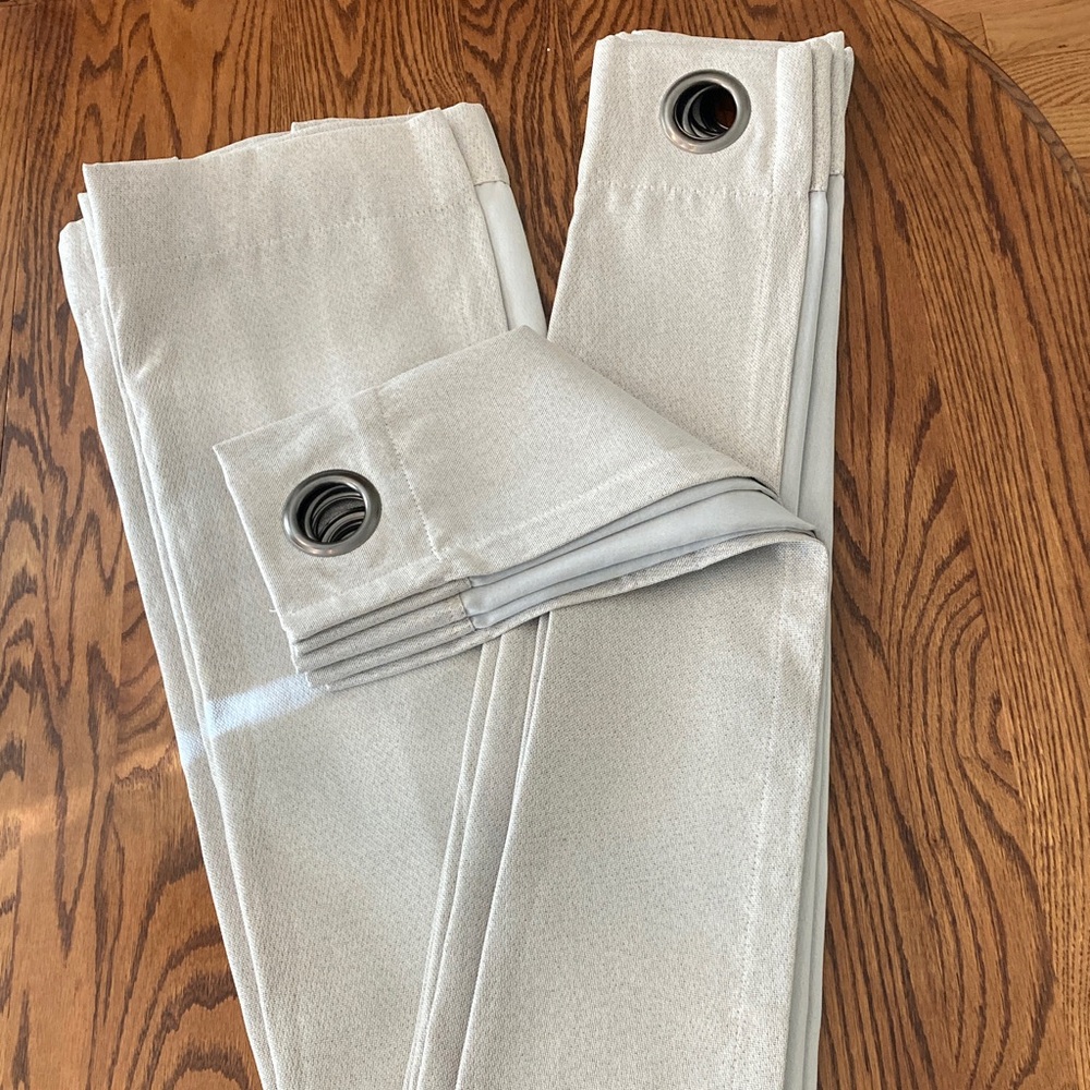 Pair of Cream Grommet Curtains